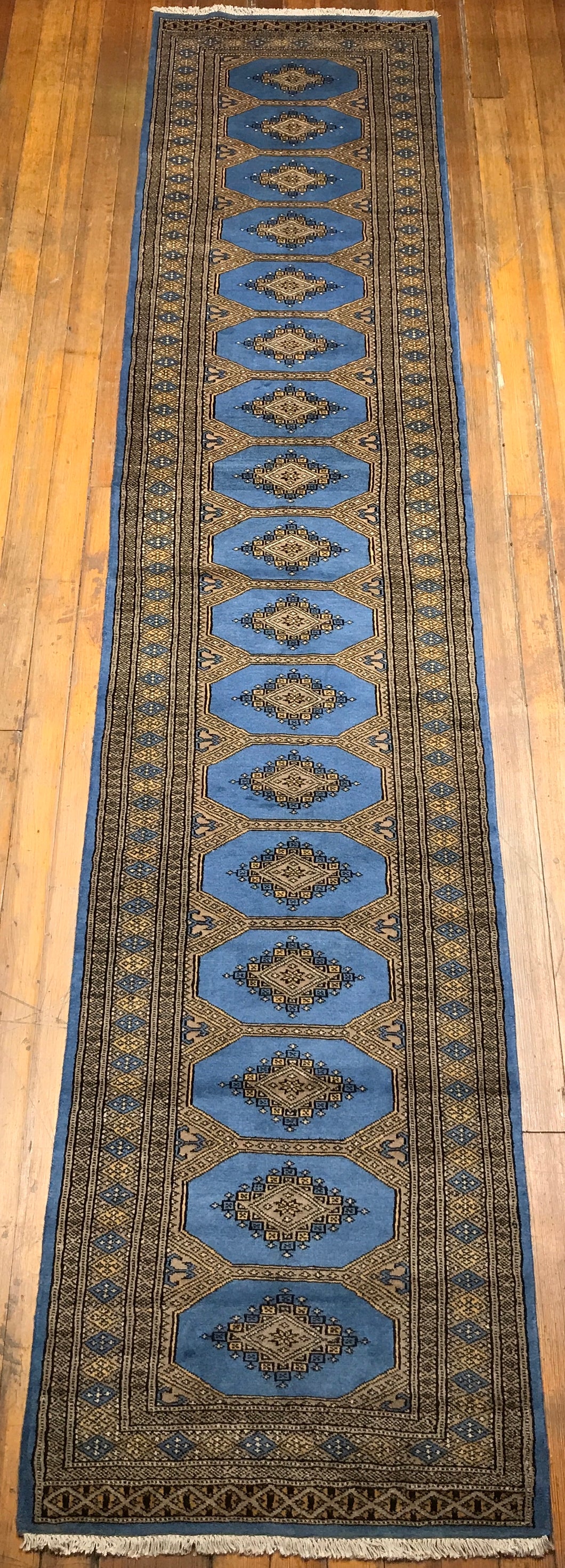 Jaldar Bokhara Rug. 12’ x 2’.6”